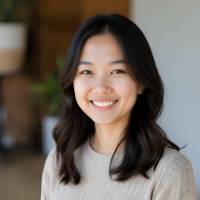 Female business owner smiling confidently after growing her online sales with chak.ai strategy