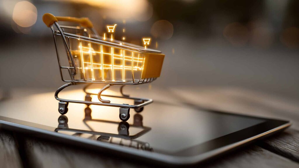 A glowing miniature shopping cart sits on a tablet, symbolizing a successful and optimized digital marketing strategy for eCommerce.