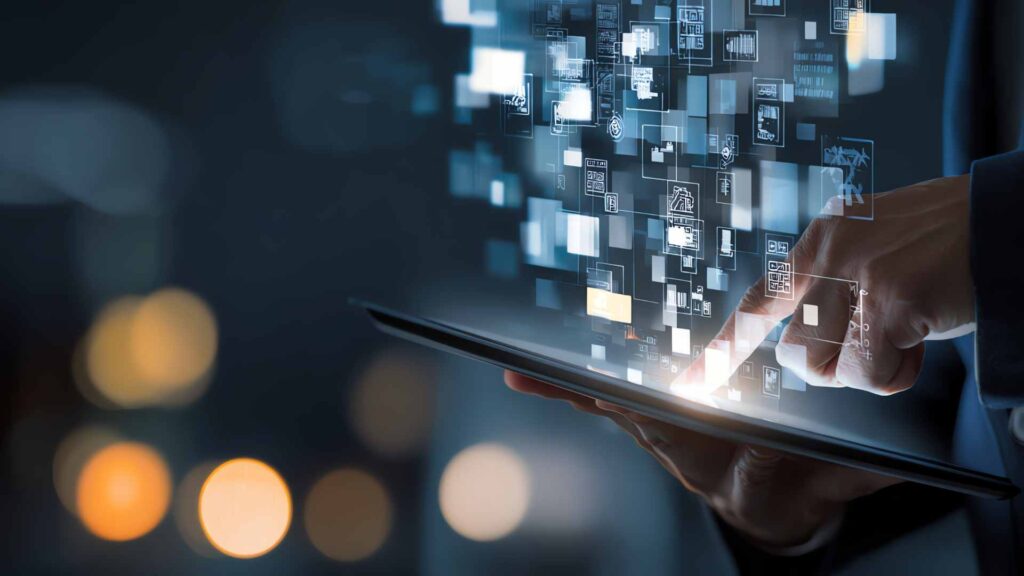 A hand touches a tablet, interacting with a flow of futuristic digital icons and data blocks, representing the future of marketing technology.